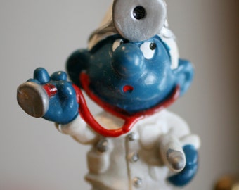 doctor smurf figurine