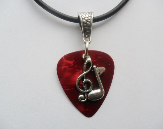 Guitar pick necklace with treble clef music note charm that is adjustable from 18" to 20" red