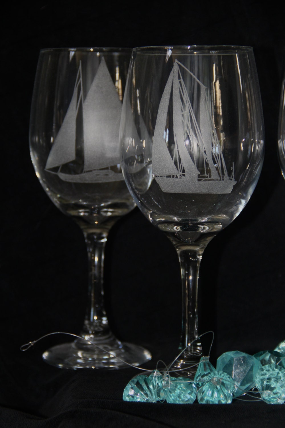 Hand etched Sailboat wine glass.