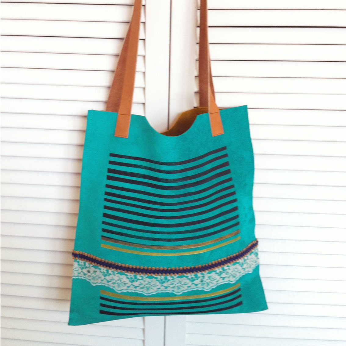teal suede handbag