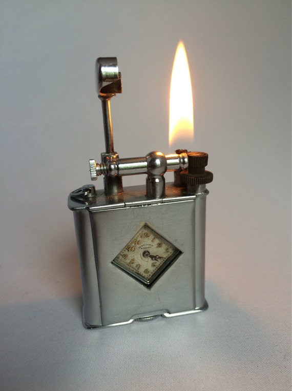 Items similar to The Golden Wheel Lighter 1920's on Etsy