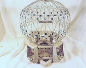 A wonderful, vintage French birdcage in a north African style in wood and wire