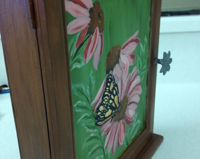 Solid Wood 14 1/2" x 13 1/2" x 3" Cabinet with 3 shelves. Coneflowers and butterfly painted in Acrylics, Metal Flower Handle