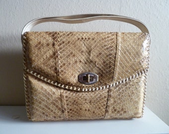 Vintage Snakeskin purse with leather stitching detail