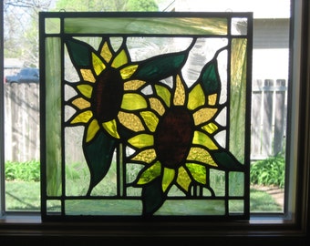 Sunflower rising stained glass window