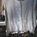 shredded white jersey top with leather epaulettes upcycled womens clothing tattered top