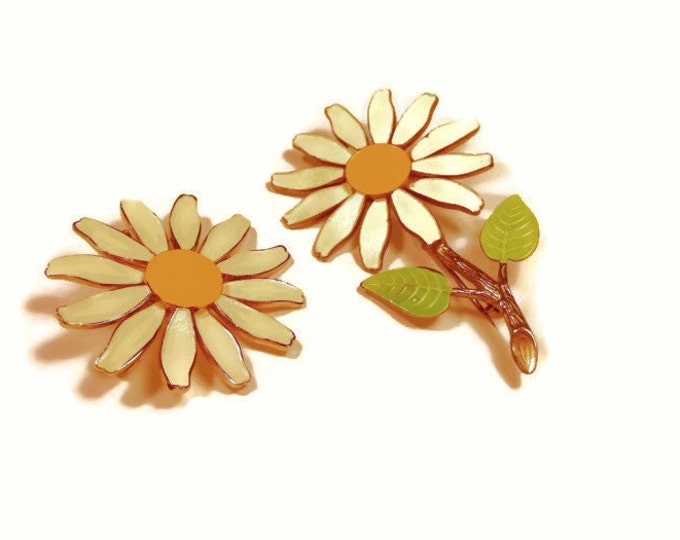 1960s daisy pair of enamel daisy brooches white with yellow center