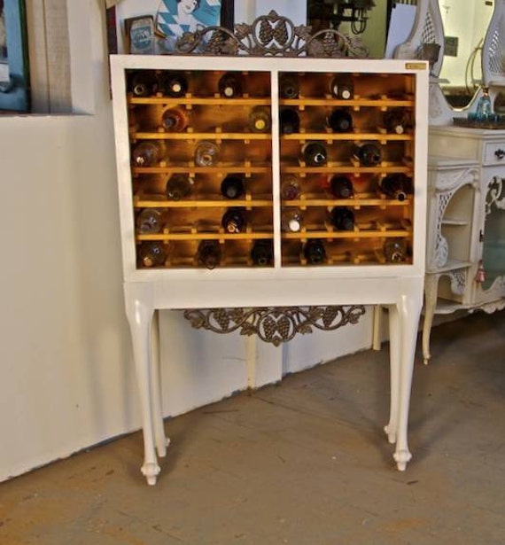 Items similar to Repurposed Salvaged Wood Wine Rack on Etsy