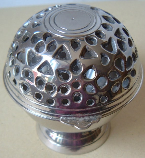 Vintage silver metal potpourri ball with hinged pierced lid