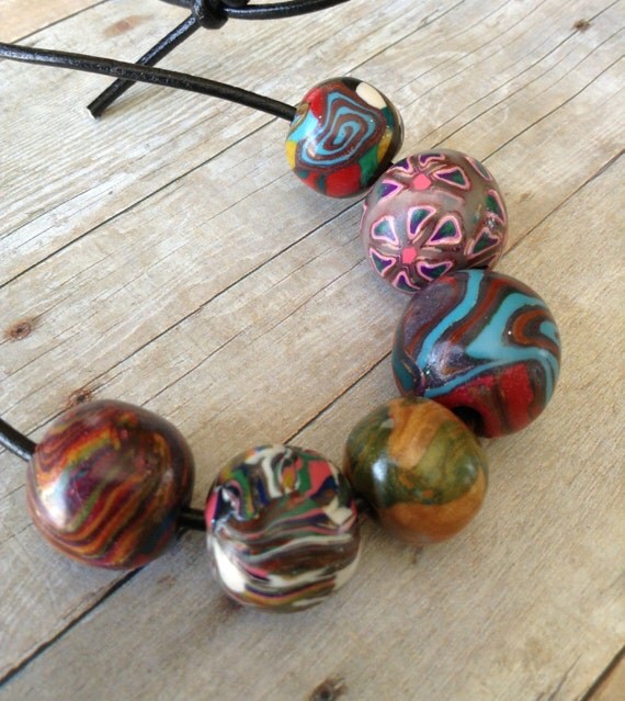 Items similar to Beautiful polymer clay leather adjustable necklace