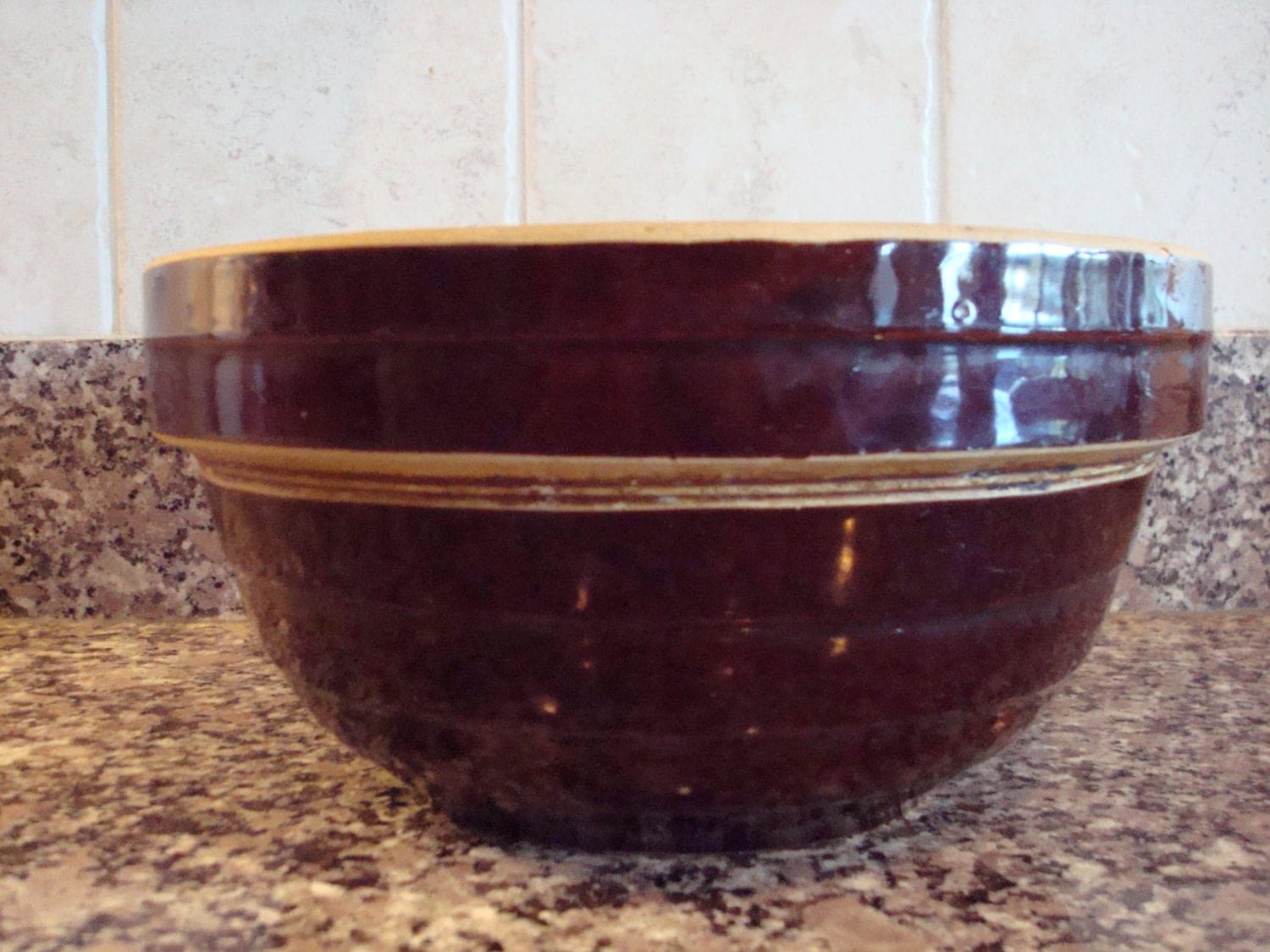 Vintage brown glazed pottery mixing bowl marked USA 9