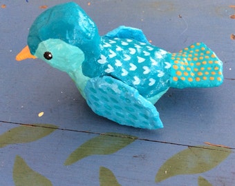 Little blue papier mâché bird sculpture
