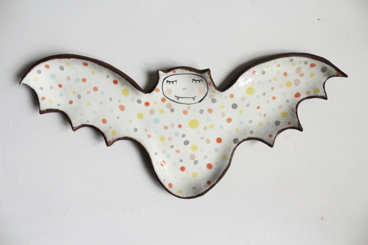 Vlad the Bat ceramic bat with chubby cheeks and by clayopera