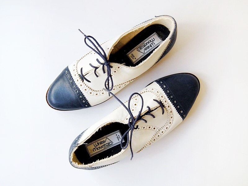 blue and white wingtip shoes