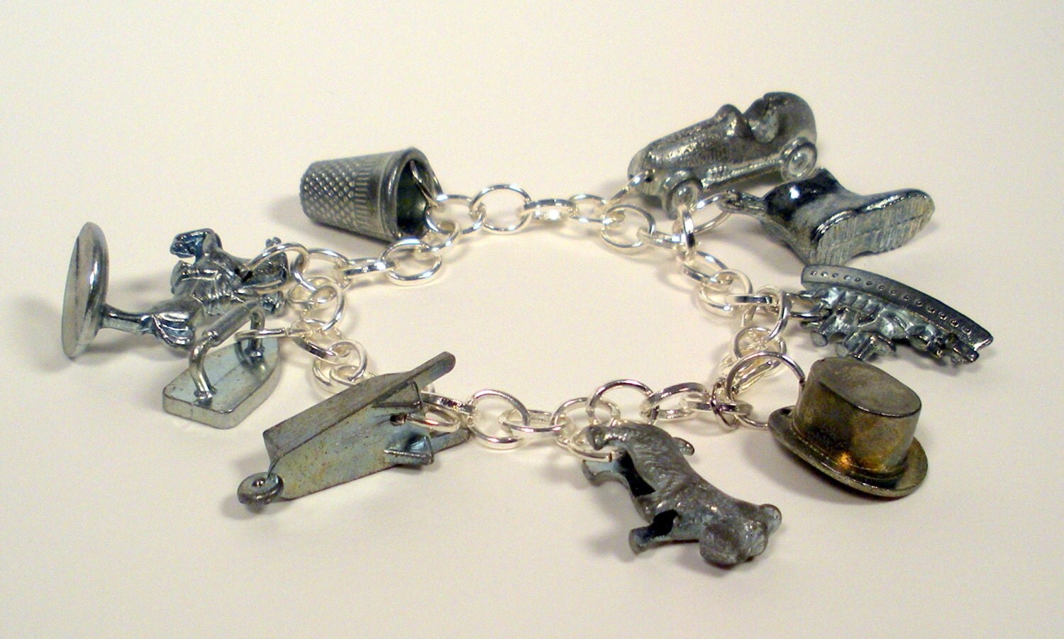 Upcycled Monopoly Game Pieces Charm Bracelet by DecoHearts on Etsy