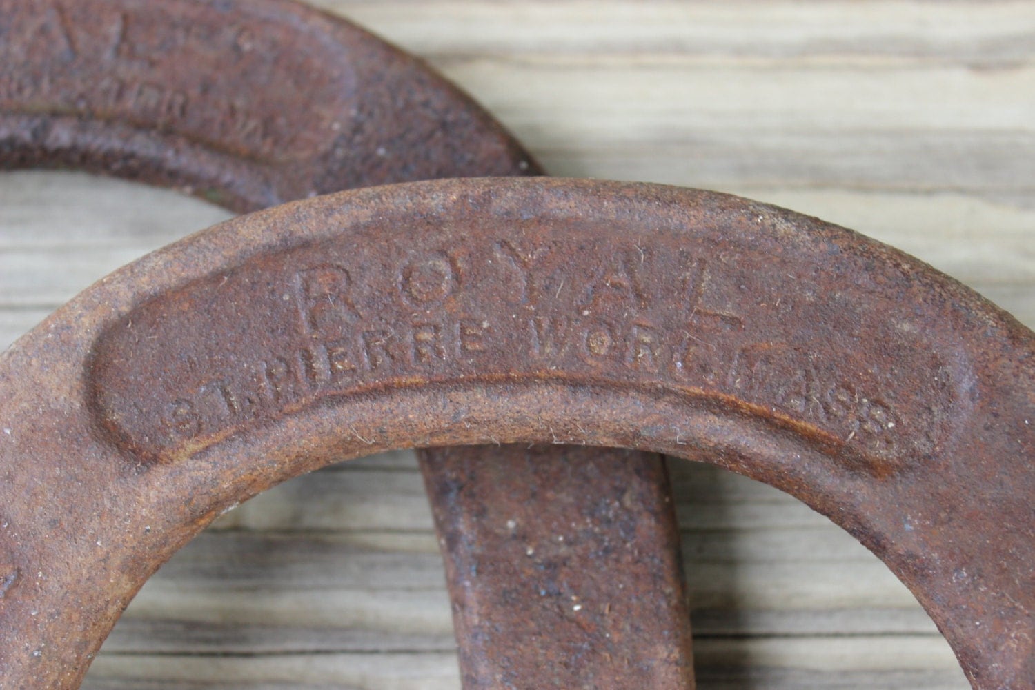 Vintage Royal St. Pierre pitching horse shoes. Worcester
