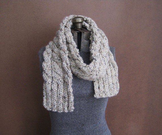 Chunky cream scarf The scarf is long allowing you to wrap it round in so many ways, making it look different every time you wear it. It comes in a mix of grey, cream and taupe, making a .