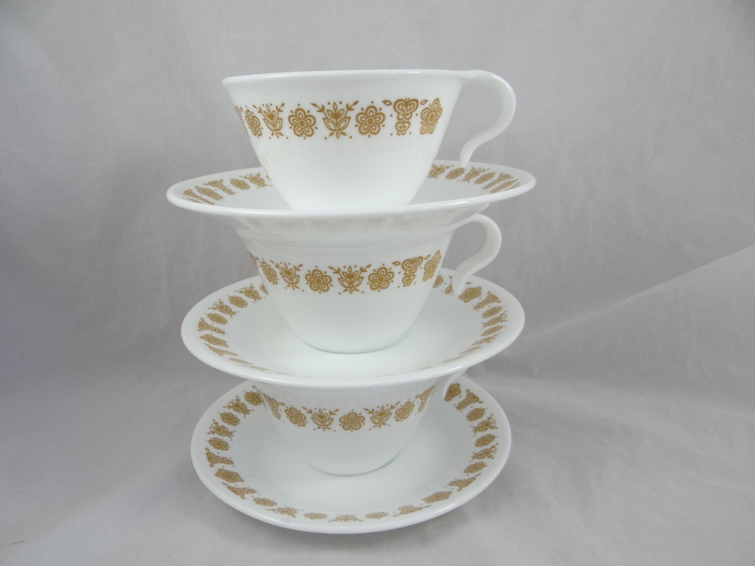 Three Gold Butterfly Corelle Tea Cups and Saucers Mid