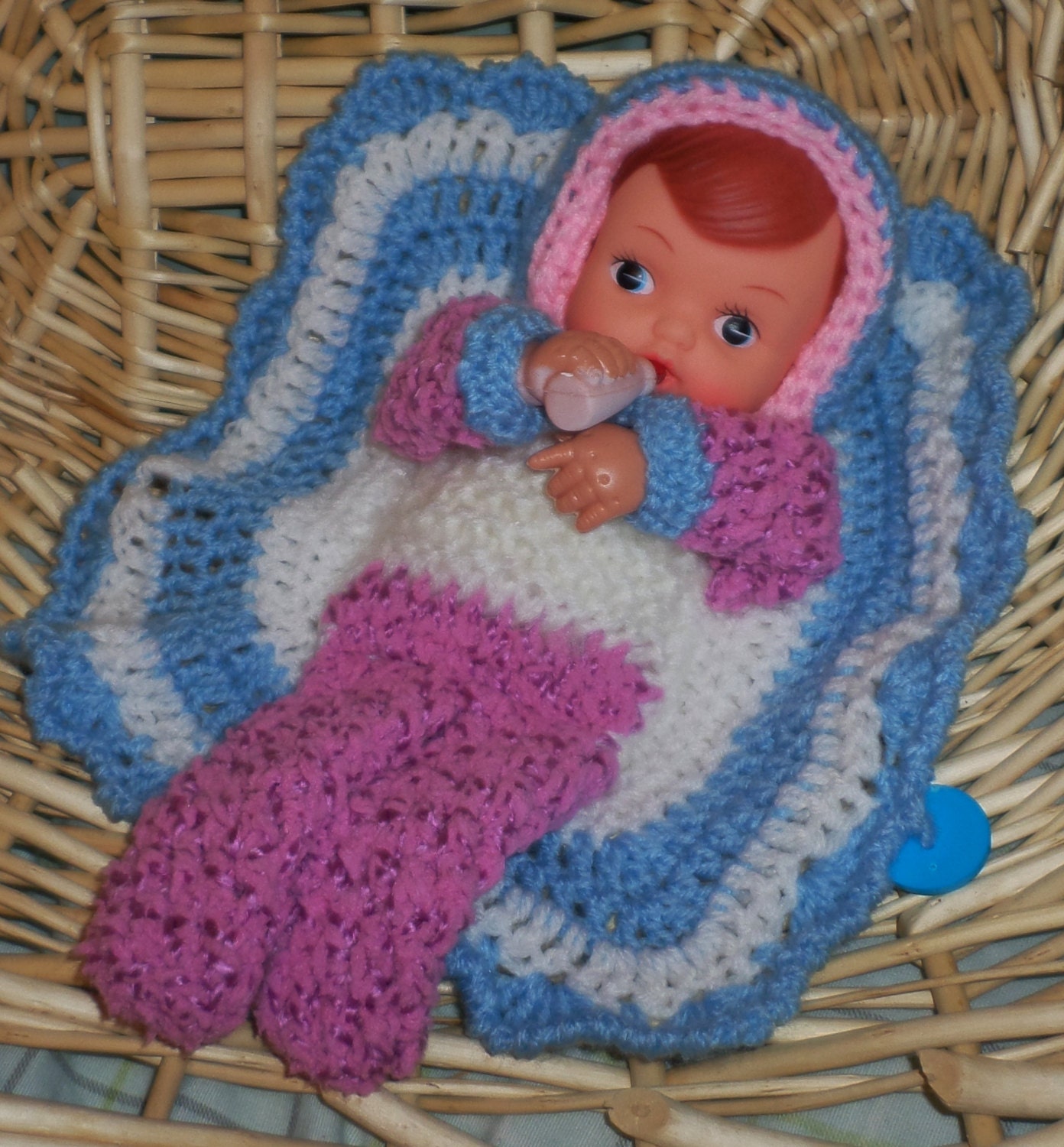 baby doll with blanket