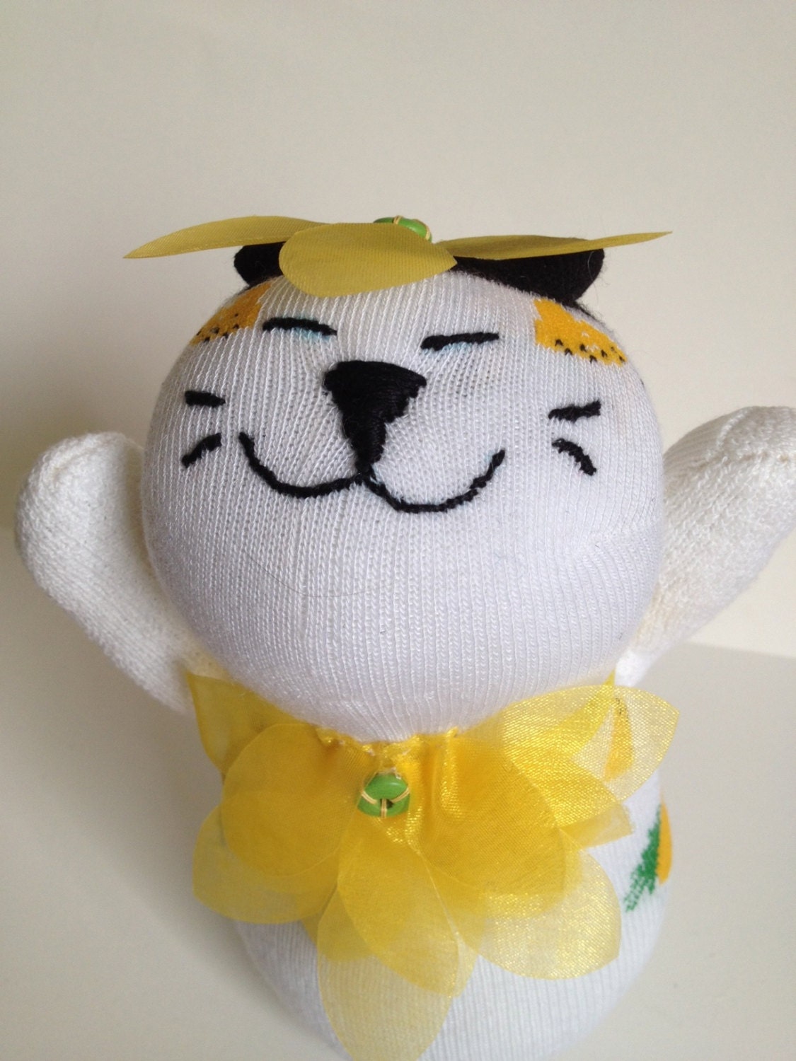 stuffed yellow cat