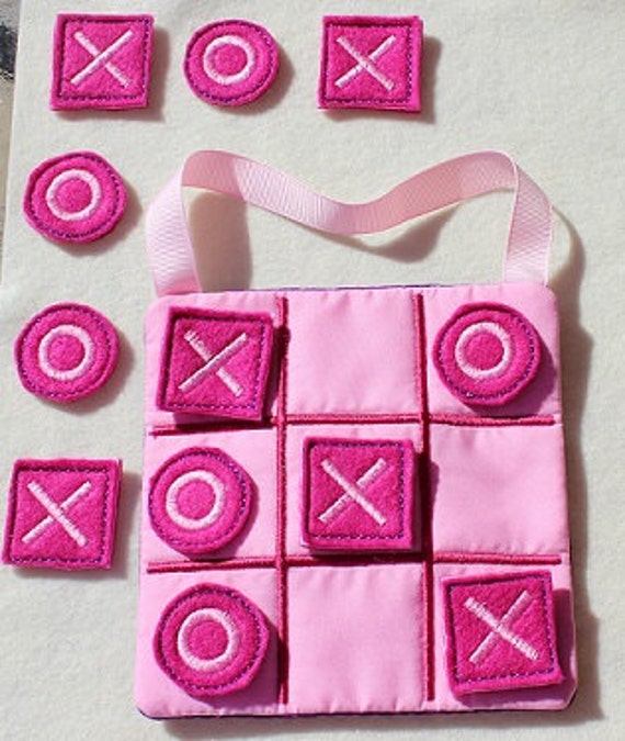 Fabric tic tac toe game with carrying handle and pocket to