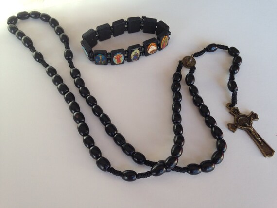 Black rosary made with wood beads and matching bracelet with