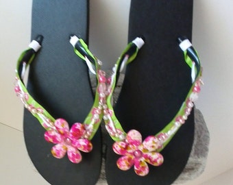 Beaded flower flip flops