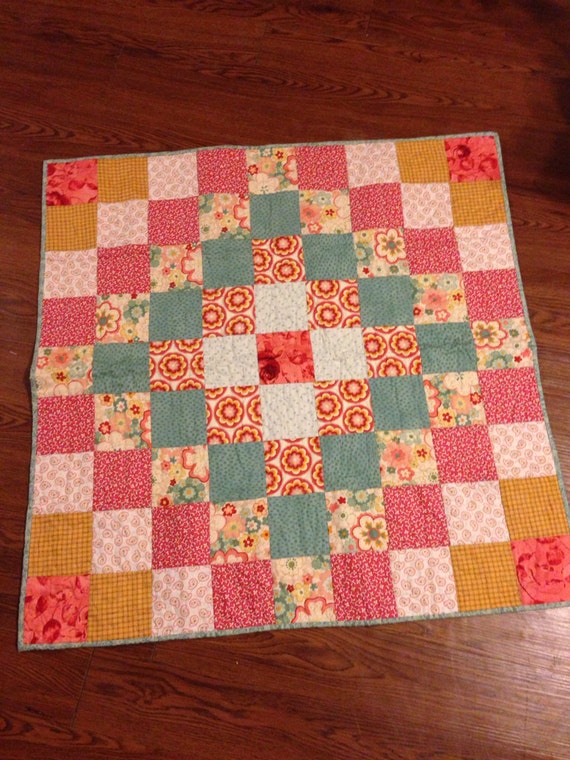 Items similar to Baby girl quilt made with fine moda fabric on Etsy