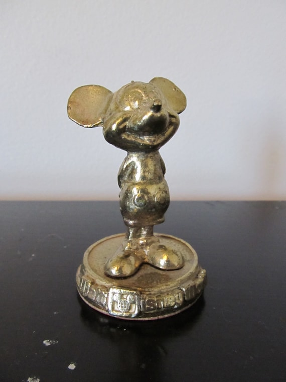 brass mickey mouse figurine