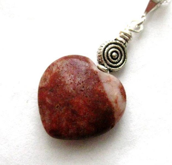 https://www.etsy.com/ie/listing/195433907/irish-jewelry-cork-red-marble-pendant?ref=listing-5