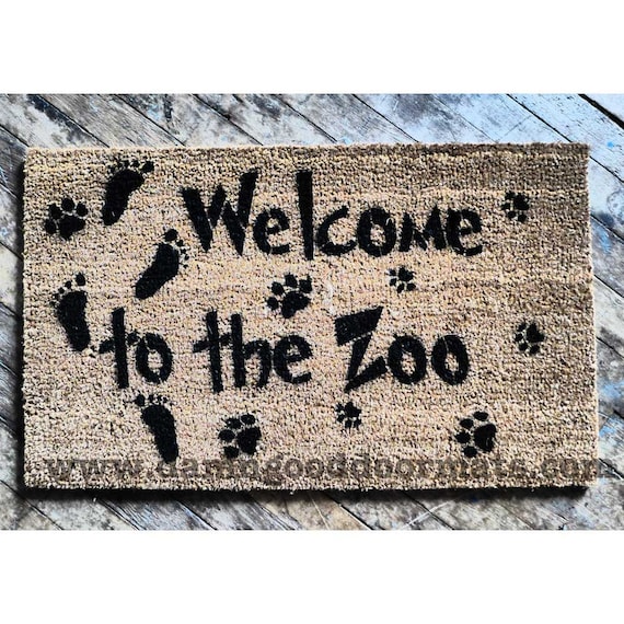 to the Zoo front door novelty doormat by DamnGoodDoormats