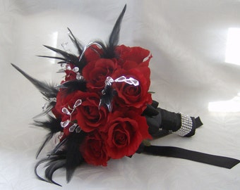 Black feather and red rose bouquet and boutonniere set