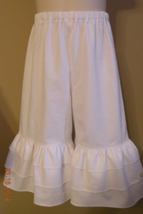 white ruffle pants