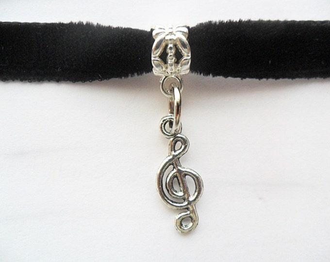 Velvet choker with treble clef note charm and a width of 3/8” Ribbon Choker Necklace (pick your neck size)