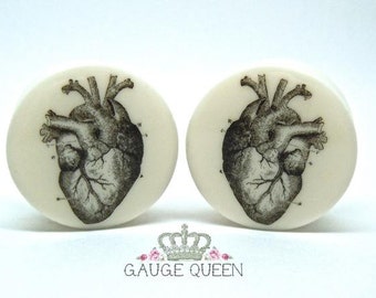 Anatomical Heart Plugs / Gauges. 4g /5mm, 2g /6.5mm, 0g /8mm, 00g /10mm, 1/2" /12.5mm, 9/16" /14mm,5/8" /16mm,3/4" /19mm,7/8" /22mm,1" /25mm