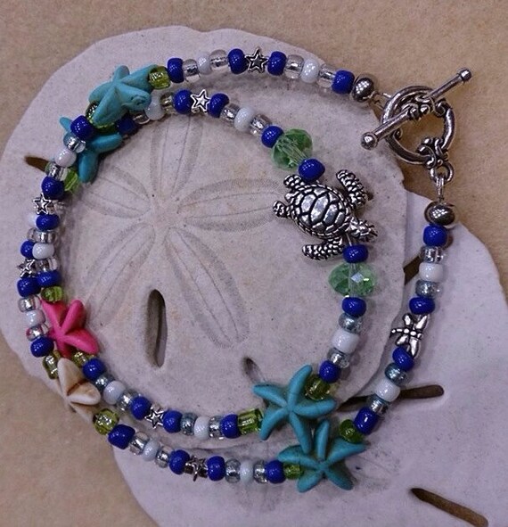 Items similar to Starfish and sea turtle wrap bracelet on Etsy