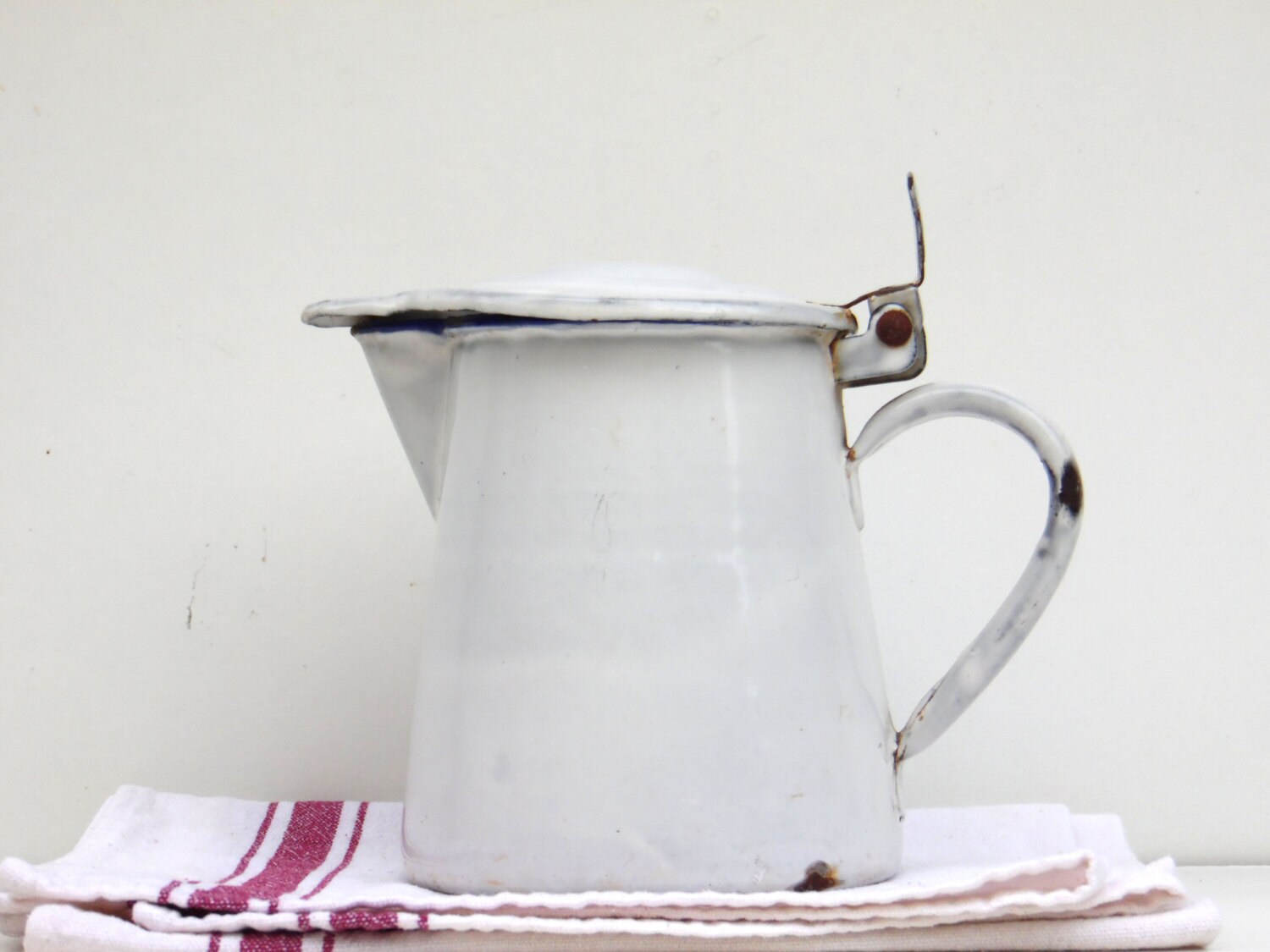 Vintage White Enamel Pitcher with Lid / Milk Jug / by AdryVintage