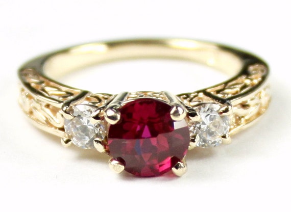 Created Ruby w/ 2 Accents 10KY Gold Ring R254