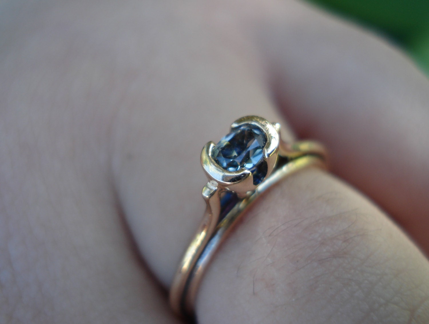 Pale blue grey sapphire engagement ring unusual gold band