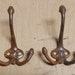 set 4 matching cast iron antique hall tree hooks with the heart