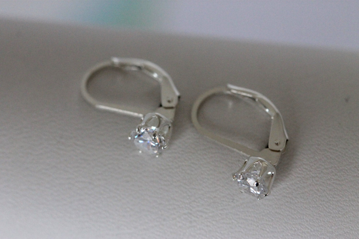 simple faux diamond lever back earrings solitaire cubic