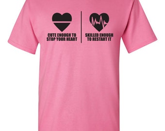 Cute enough to stop your heart - Skilled enough to restart it tshirt. cardiologist tshirt. hospital tshirt. nurse tshirt. heart. TH-082Blk