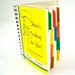 Yellow cookbook with colorful tabs, vintage wedding shower kitchen gift idea for men and women by Dorothy from over the rainbow in Kansas.