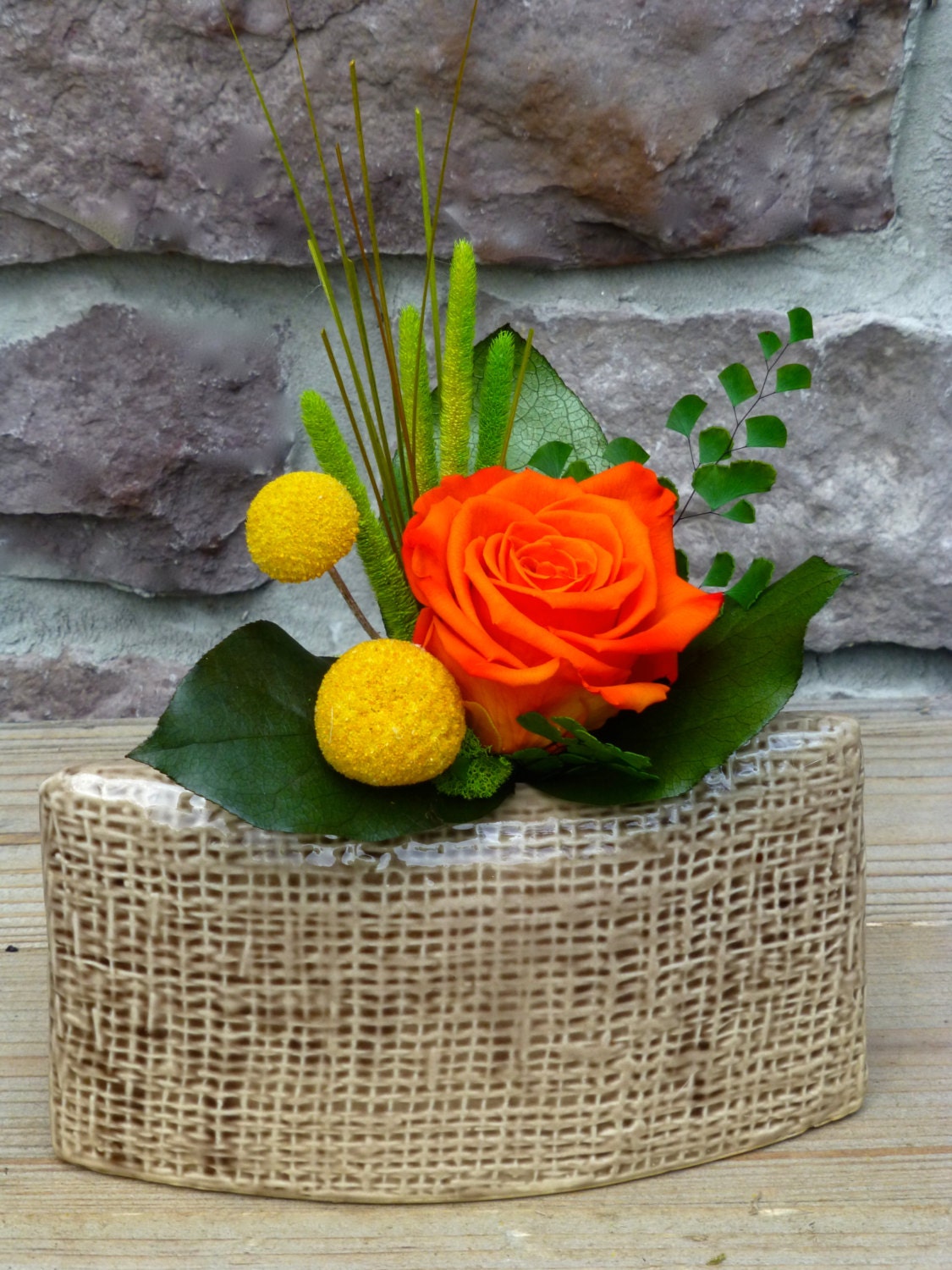 Single rose arrangement in a burlap bud vase by floralartstudio