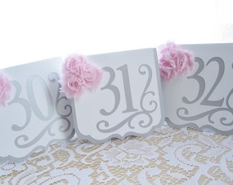 Items similar to Wedding Table Numbers - 