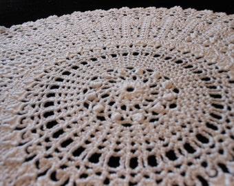 18" round white doily that is sure to please