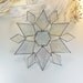Star. Snowflake With A Snowflake Pattern In The Middle. Holiday ornament. Suncatcher. No. 23.