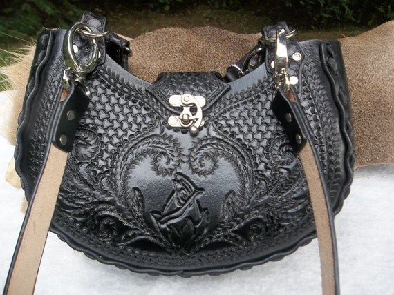 black tooled leather bag