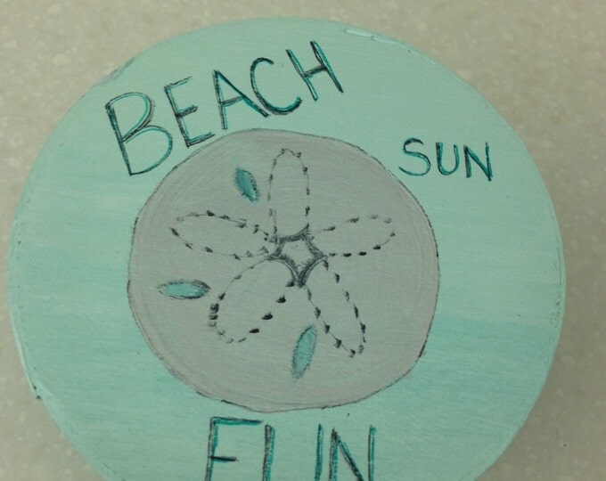 4 1/2" diameter round wood box with lid. Aqua with sand dollar and "Beach, Fun, Sun" on Top