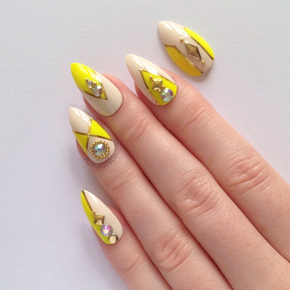 Neon yellow fake nails Nail designs Nail art by prettylittlepolish